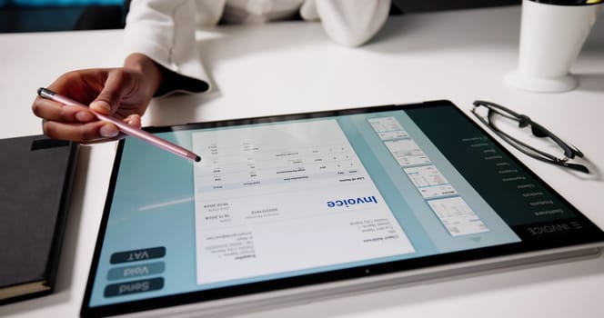 Digital African American Accountant Calculating Invoice Using Hybrid Tablet