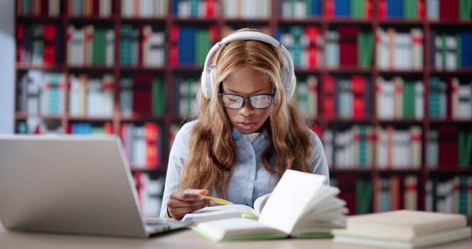 Online Learning: African-American College Student Studying With Laptop At University