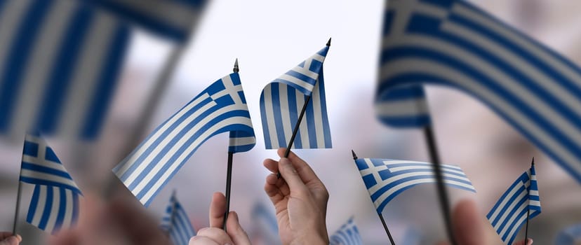 Greece flags in their hands on a blurred urban background. The photo illustration was created without the use of artificial intelligence, only using Photoshop.