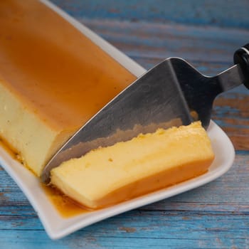 Cream caramel pudding with caramel sauce on a plate, Flan, High quality photo