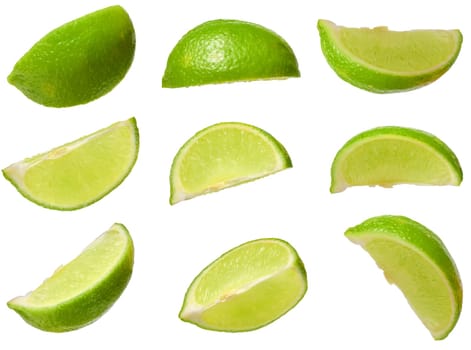 Collection of juicy green lime slices from different angles. Citrus fruit cutouts for food design, set of fresh lime wedges on  isolated background