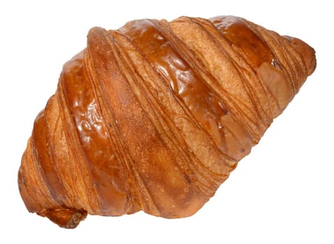 Appetizing, golden brown croissant with a glossy surface. Isolated background
