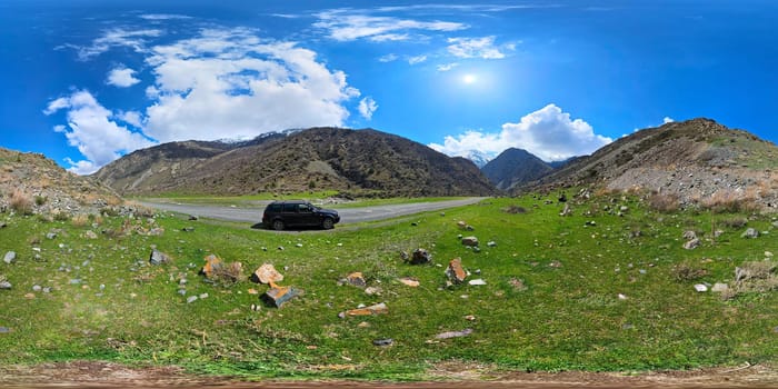 Full Spherical HDRi panorama of springtime mountain gorge dirt road with black car in equirectangular projection