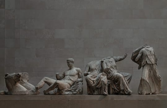 London, UK - May 31, 2025 - The famous Elgin Marbles, originally part of Parthenon sculptures and Acropolis inside of British Museum. use it as your Wallpaper, Poster and Space for text, Selective focus.