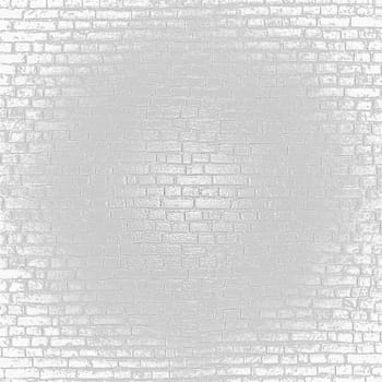 White painted brick wall providing a clean and textured backdrop