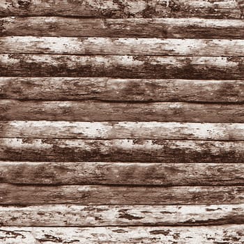Close-up view of weathered wooden planks with peeling paint, creating a rustic and textured background