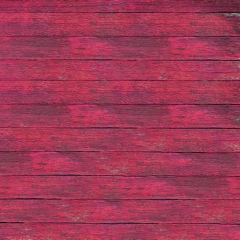 Pink painted wooden boards creating a weathered, rustic background texture, ideal for design projects needing a vintage or aged feel