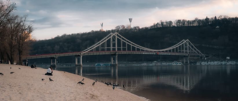 KYIV, UKRAINE Pedestrian bridge over Dnypro river in Kyiv. High quality photo