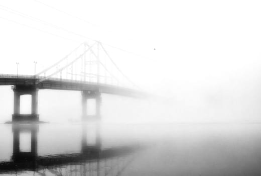 In the embrace of the ethereal mist, a bridge stands as a gateway to the unknown, connecting the shores of reality with the veiled realms of mystery.