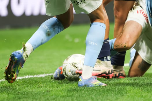 MELBOURNE, AUSTRALIA - MAY 31: Tackling during the A-League Men's Grand Final match between Melbourne City and Melbourne Victory at AAMI Park on May 31, 2025, in Melbourne, Australia.
