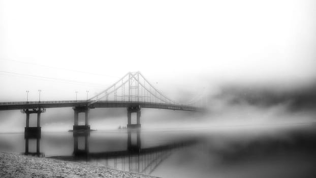 In the embrace of the ethereal mist, a bridge stands as a gateway to the unknown, connecting the shores of reality with the veiled realms of mystery.