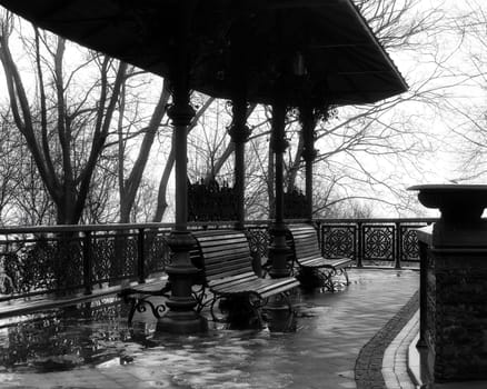 Resting place on walking path with bench. High quality photo