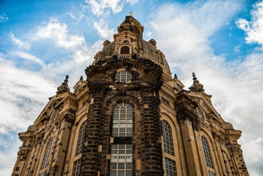 Facade of Frauenkirche (Our Lady church) in Dresden, Germany at day, upshot with great sky. Heavily ruined in WWII church was restored then.