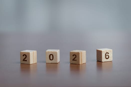 Wooden blocks displaying 2026. Concept of new beginnings, future aspirations, goal setting, planning, and countdown to the new year.