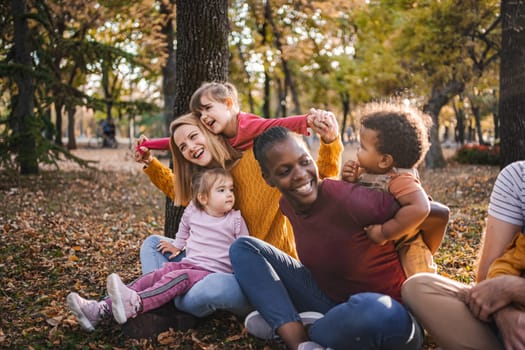 Autumn Embrace: A Tapestry of Family Love.