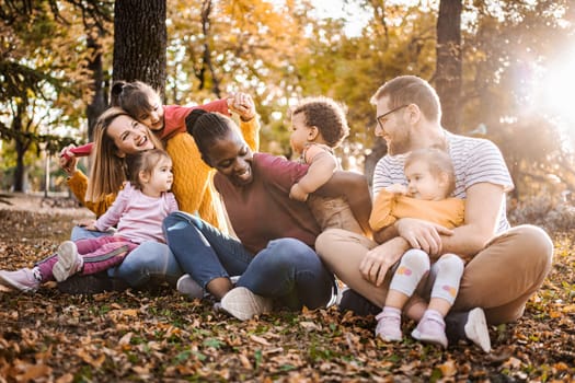 Autumn Embrace: A Tapestry of Family Love.