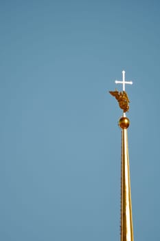 the Peter and Paul Fortress spire at sunset. High quality photo