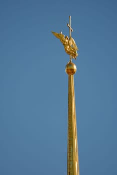 the Peter and Paul Fortress spire at sunset. High quality photo