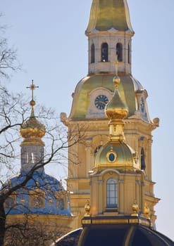the Peter and Paul Fortress spire at sunset. High quality photo