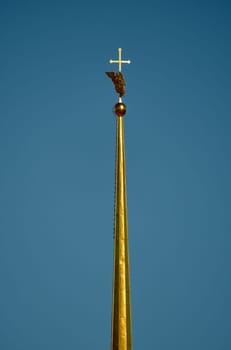 the Peter and Paul Fortress spire at sunset. High quality photo