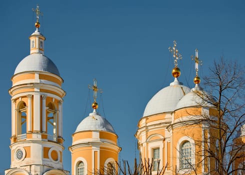 domes with golden crosses of the Prince Vladimir Cathedral on a sunny day. High quality photo