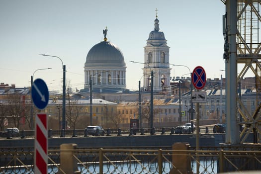 Russia, St.Petersburg, 27 March 2025: Church of St. Catherine the Great Martyr on a sunny spring day, Makarov Embankment, ice drift on the Neva River. High quality photo