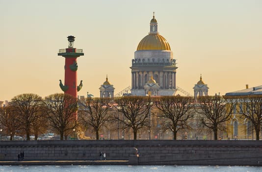 ice drift on the Neva River with a view of the arrow of Vasilyevsky Island with rostral columns, the Winter Palace, St. Isaac's Cathedral, the Savior on Spilled Blood. High quality photo