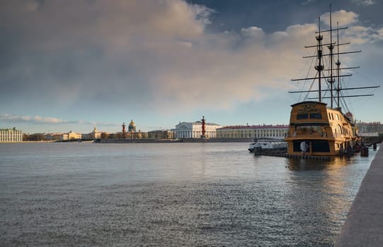 ice drift on the Neva River with a view of the arrow of Vasilyevsky Island with rostral columns, the Winter Palace, St. Isaac's Cathedral, the Savior on Spilled Blood. High quality photo