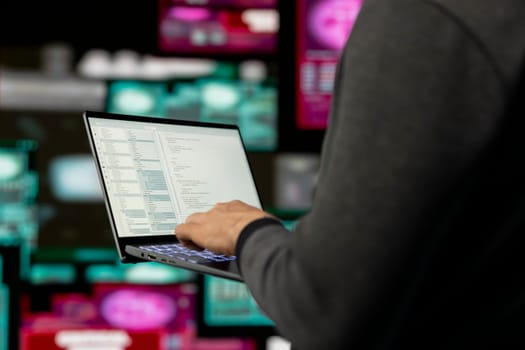 Cyber crime unfolds as a spy is targeting network systems with code, bypassing encryption and engaging in exploit. Man practices identity theft and data breaches through AI manipulation.