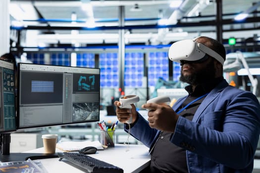 Solar panels factory engineer using VR headset to improve solar energy automation, eco friendly. Photovoltaics manufacturing plant specialist using virtual reality equipment, high tech.