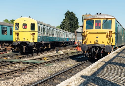 Royal Tunbridge Wells, UK - Apr 30, 2025 - View of Train engine or Locomotive and railway coaches in the Tunbridge Wells railway station and ready to leave. use it as your Wallpaper, Poster and Space for text, Selective focus.