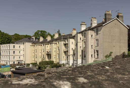 Royal Tunbridge Wells, UK - Apr 30, 2025 - Exterior view of Nevill Terrace, Tunbridge Wells, Kent, Residential architecture of apartment building in Royal Tunbridge Wells, use it as your Wallpaper, Poster and Space for text, Selective focus.