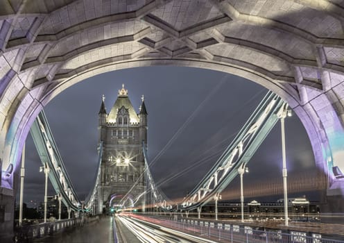 London, UK - May 07, 2025 - The magnificent view of The Tower Bridge with blue sky in the background after sunset. Famous Iconic Bascule bridge in London, use it as your Wallpaper, Poster and Space for text, Selective focus.