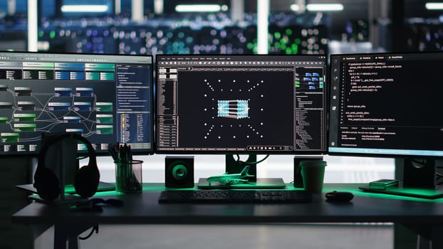 Visual programming systems in data center tracking system integrity and infrastructure performance. PC screens in server hub displaying node tree programming detecting equipment issues
