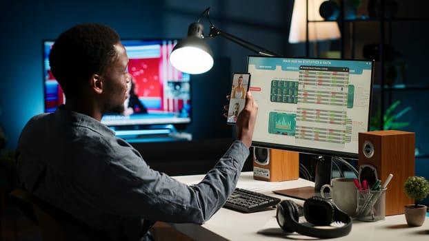 Black economist on video conference chat with consultants analyze earnings balance and tracking financial fluctuation for a potential growth. Specialist debating with his associates. Camera B.