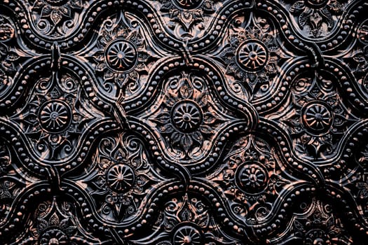 a thing used to make something look more attractive but usually having no practical purpose, especially a small object