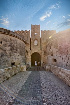 Rodas. Greece - June 04, 2025: Grand entrance to the historic Palace of the Grand Master in Rhodes, showcasing medieval architecture and a sunny day.