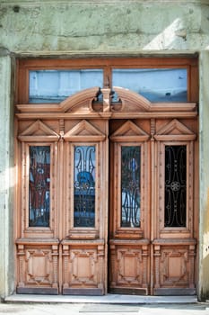 Carved ancient wooden doors in oriental or Georgian style.