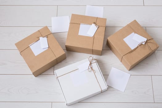 Many boxes with space for advertisement delivered from online store. Internet shopping and delivery.