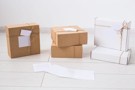 Many boxes with space for advertisement delivered from online store. Internet shopping and delivery.