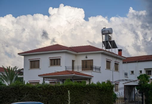 Charming old houses with wooden balconies and tiled roofs in the historic town of Lefke, Northern Cyprus.