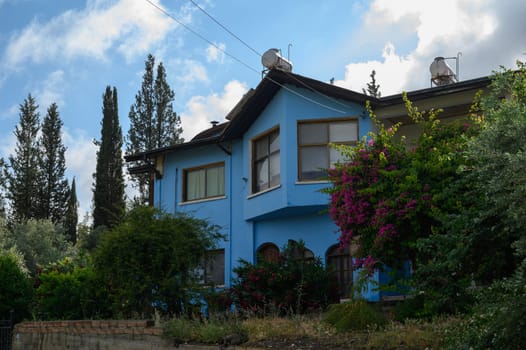 Charming blue-painted house with fairytale-like appearance in the historic town of Lefke, Cyprus.