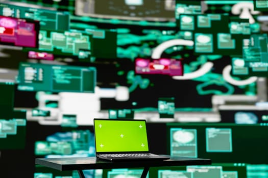 Empty scene with green screen on laptop showcases quantum threat on the dark web, space for a cyber crime with system override and identity theft. Cracking passwords to steal data.
