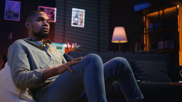 African american guy engaging in a virtual workshop to learn skills for new job, interacting with the coach. Ambitious man joining an interactive web learning session for development. Camera A.