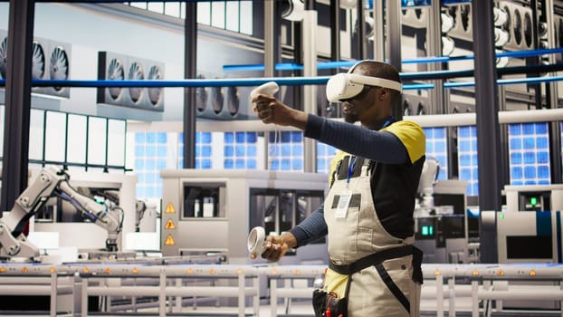 Smart factory specialist using virtual reality simulation to predict equipment failures. Industry 4.0 plant engineer using VR headset to follow maintenance procedures and repair damages, camera A