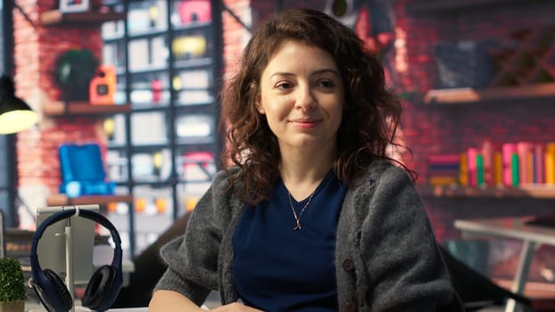 Software developer at agency office coding on her computer, creating a software and works on implementing algorithms. IT expert building applications with a programming interface. Camera B.