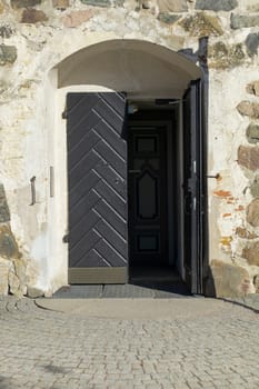 A peaceful Lutheric cemetery in Finland, door to the medieval stone church.