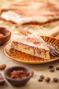 Homemade gluten free almond and cinnamon cake with cup of coffee