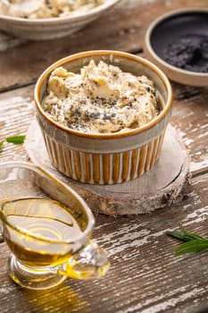 Homemade truffle butter with olive oil and black salt