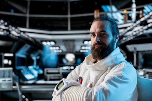 Portrait of cosmonaut testing gear during routine equipment check inside space station. Astronaut in spacecraft powered by advanced engineering running diagnostics to confirm suit integrity